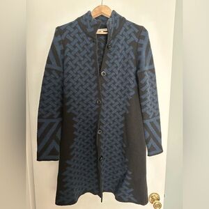 Woman’s long sweater